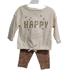 This Top Sits Pretty Over A Pair Of Easy-On Stretch Leggings.